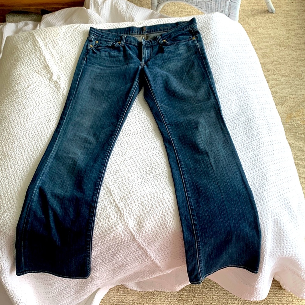 Seven for all mankind boot cut jeans. inseam 32 inches size 31.